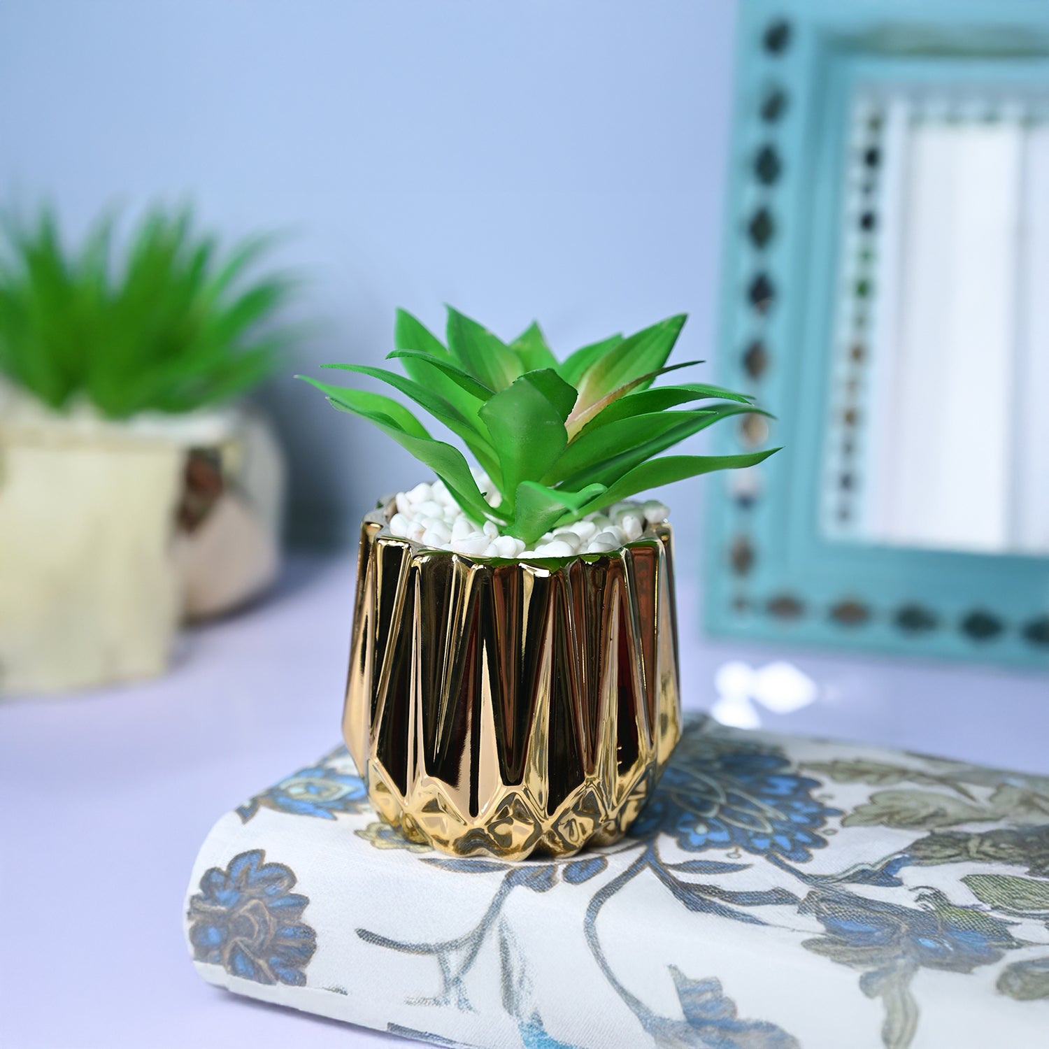 small artificial plant in gold pot Golden Elegance