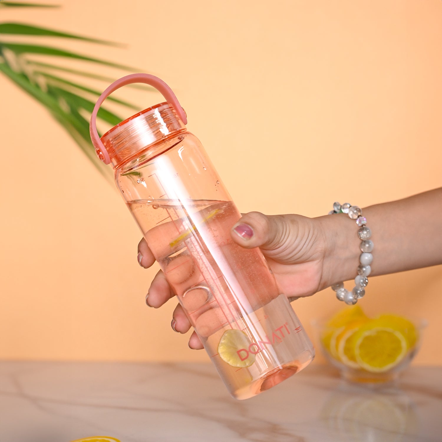 Donati Travel Bottle 530ML - Peach Plastic Glossy Finish