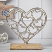 Silver Hearts Sculpture on a Wooden Base