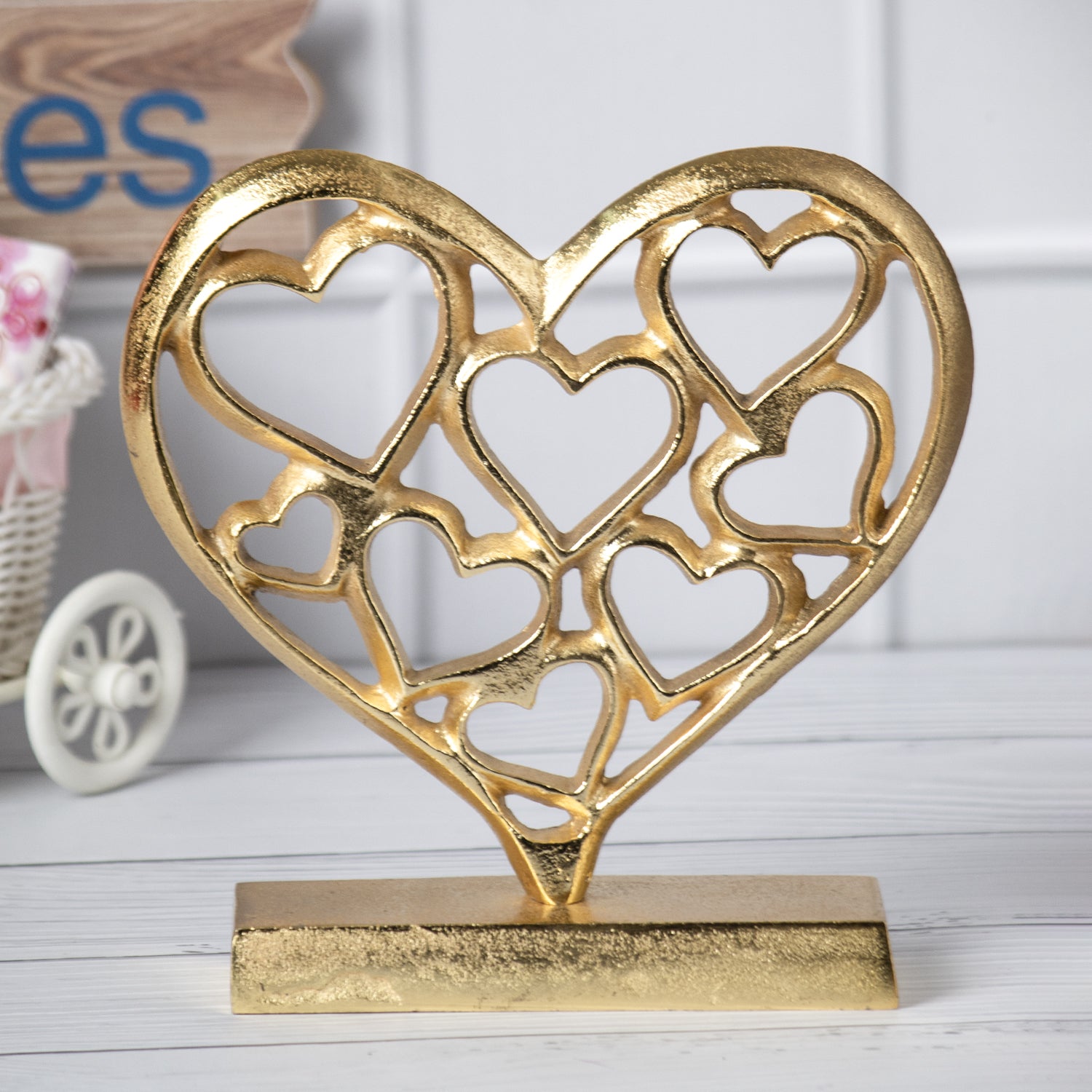 Golden Hearts Sculpture on a Wooden Base