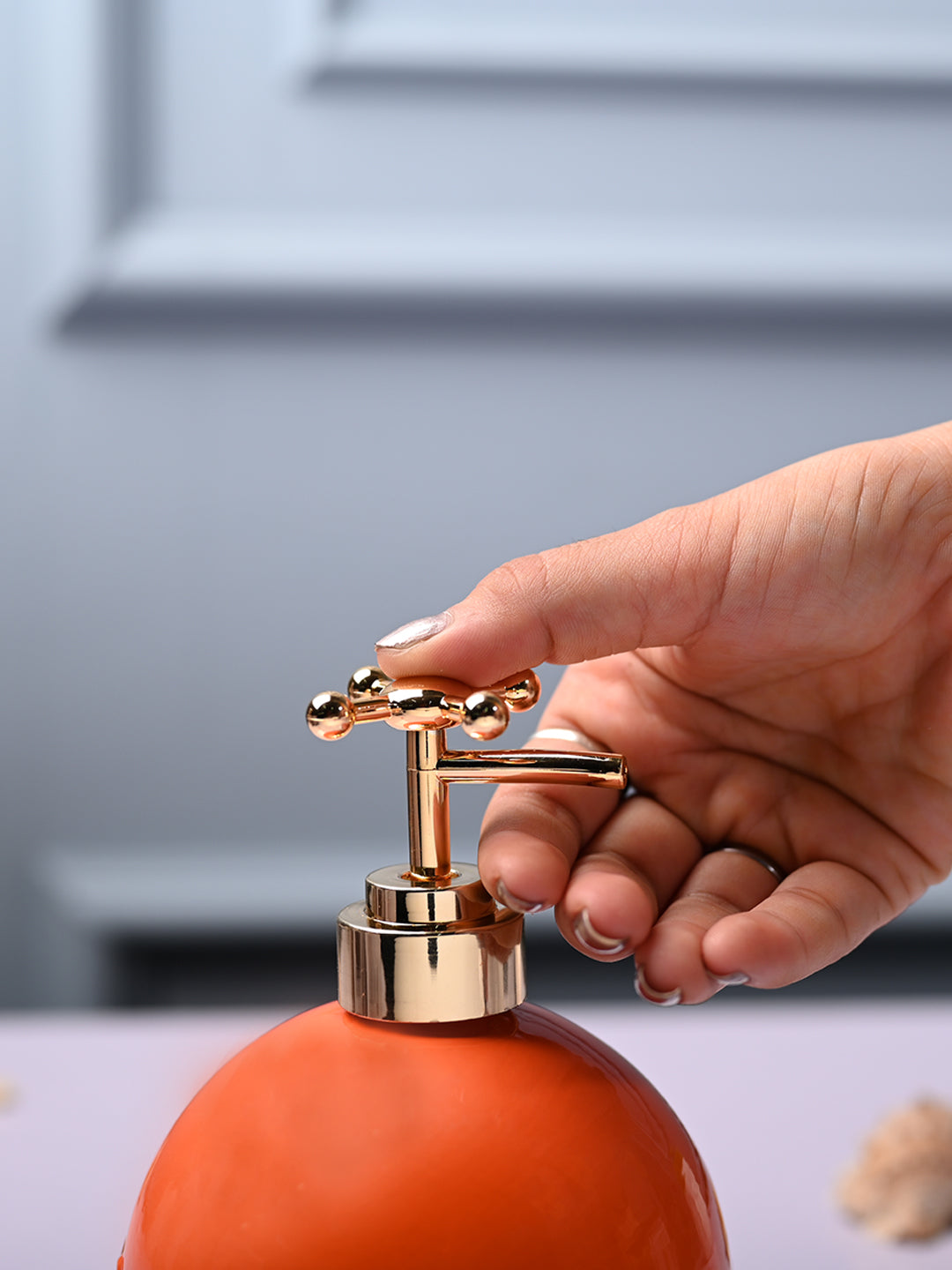 Ceramic Orange Round Soap Dispenser - Embossed Glossy Finish