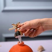 Ceramic Orange Round Soap Dispenser - Embossed Glossy Finish