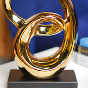 MARKET99 Ceramic Looping Shape Sculpture Decor Object in Black & Golden